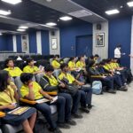 Epistemo school students attending an experiential learning workshop with Star Hospitals in a presentation room.